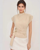 Semi turtleneck short sleeved button top with waist tie for women, crafted from soft breathable fabric, featuring a relaxed silhouette and a unique waist knot detail perfect for spring and summer minimalism .