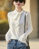 Elevate your wardrobe with our tie neck knit long sleeve top.Shop Gentle Herd for minimalist luxury.