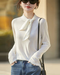 Elevate your wardrobe with our tie neck knit long sleeve top.Shop Gentle Herd for minimalist luxury.
