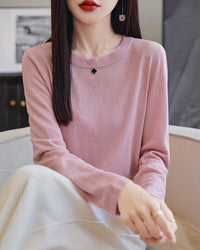 Women's oversized loose-fit sweater made from a soft lightweight wool blend, perfect for layering.