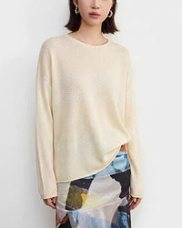 Apricot silk washi yarn crew neck long sleeve knit top for women, crafted from a premium silk blend, featuring elegant side slits and a relaxed fit, perfect for spring office wear and quiet luxury daily styling.