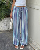 Elevate your warm-weather wardrobe with our striped drawstring wide leg pants. Lightweight, breathable, and effortlessly chic, perfect for brunch, beach days, and casual outings.