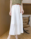 Elevate your warm-weather wardrobe with our tiered elastic waist maxi skirt. 