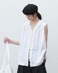 Ruffled v-neck button down shirt for women, crafted from soft and breathable premium fabric, featuring a relaxed silhouette and a unique ruffled detail, perfect for spring.