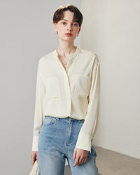 Front view of a women's loose long sleeve silk shirt featuring a chic stand-up collar, crafted from pure mulberry silk for a luxurious Spring and Summer office look.
