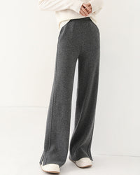 Women's Wool wide-leg sweatpants featuring high-quality wool fabric, a drawstring closure, ribbed cuffs, and a loose fit for comfortable lounging or cool indoor city outings.