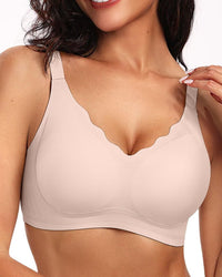 Eamless wireless bra with scalloped neck and wide adjustable straps. Smooth invisible finish for all day daily wear under blouses and tees.