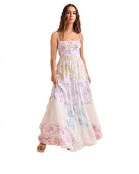 Discover the ultimate warm-weather essential: our Pastel Floral Tiered Maxi Dress.