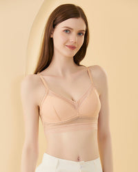 Breathable sheer mesh wireless bra with striped trim and adjustable thin straps. Natural soft cup design for warm weather daily layering.