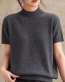 Elevate your everyday style with our soft wool short sleeve knit top. Timeless mock neck design for work, weekends, and effortless elegance.