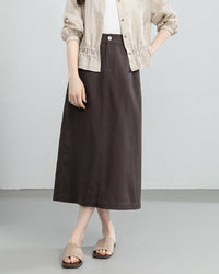 Women's retro linen blend straight skirt featuring a high-waisted design and a solid hue, offering a structured silhouette perfect for vintage-inspired fashion.