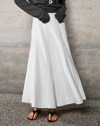 Women's high-waisted structured panel A-line skirt made from premium [Material] and a tailored silhouette perfect for office wear.