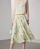 Women's crepe print silk midi skirt featuring a design on luxurious and a flowy silhouette perfect for spring and summer fashion.