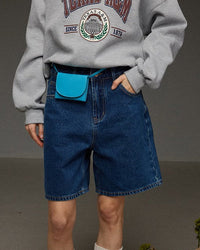 High-waisted straight-leg denim shorts crafted from durable stretch denim, featuring a relaxed silhouette and clean stitching, perfect for casual everyday styling and versatile summer outfits.