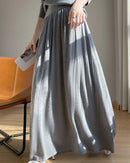Elevate your wardrobe with our gathered waist knit maxi skirt. Soft, lightweight and effortlessly chic, perfect for transitional weather, work, and evening events. 
