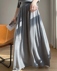 Elevate your wardrobe with our gathered waist knit maxi skirt. Soft, lightweight and effortlessly chic, perfect for transitional weather, work, and evening events. 