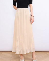 Elevate your wardrobe with our lightweight pleated maxi skirt. Crafted for comfort and sophistication, it transitions seamlessly from work to weekend. Shop Gentle Herd’s minimalist women’s skirts now.