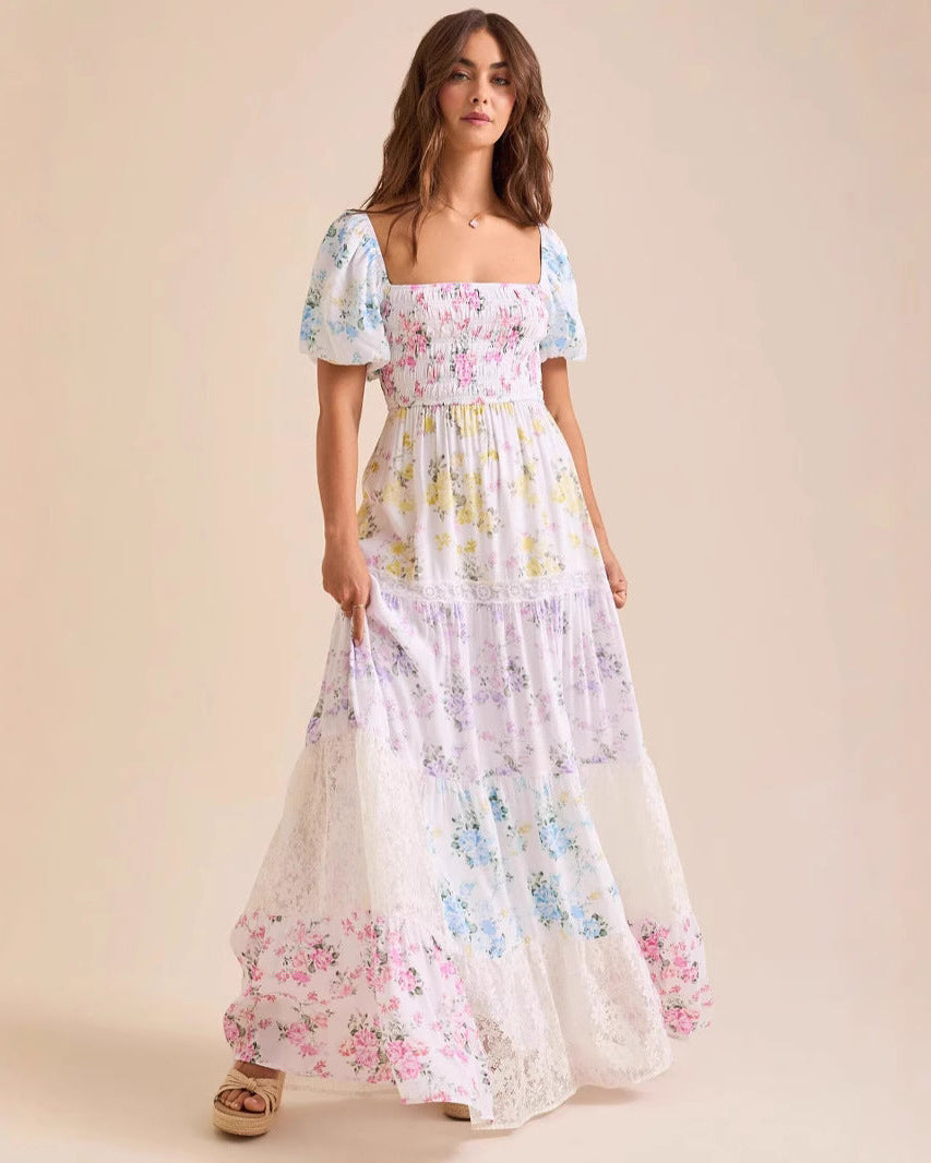 Discover our flowy pastel floral maxi dress with smocked bodice, puff sleeves, and delicate lace trim.