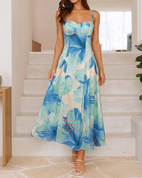 Elevate your warm-weather wardrobe with our floral print bustier midi dress. Silky smooth, effortlessly chic.