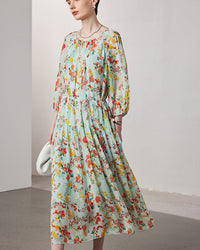Women's summer mulberry silk two-piece dress featuring a micro-transparent floral print and seven-quarter length sleeves for a breezy layered look.