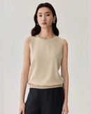 Elevate your wardrobe with our sleeveless crew neck knit top. Soft, smooth, and effortlessly chic, perfect for office, layering, and casual outings. Shop Gentle Herd for minimalist luxury.
