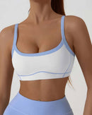 Woman powering through a Cross-Border Sports Yoga Underwear Vest, 75 % nylon / 25 % spandex and criss-cross back give shock-proof support—your quick-dry 70-85 °F summer-to-fall layer for yoga, running or cycling.