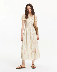 Women's apricot printed halter-neck dress – ruffled details, waist-accentuated fit, polyester fabric, pullover design, perfect for summer casual outings or light occasions.