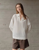 Women's white retro shirt - long-sleeved V-neck design, cotton-linen blend fabric, tatting craft and loose fit, midweight texture perfect for spring/autumn commutes, office casual or weekend outings.