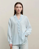 Women’s romantic ruffles V-neck pullover blouse with loose long sleeves—airy spring top for office days, weekend brunches or evening cocktails.