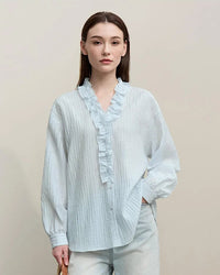 Women’s romantic ruffles V-neck pullover blouse with loose long sleeves—airy spring top for office days, weekend brunches or evening cocktails.