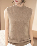 100% merino wool sleeveless mock neck sweater vest. Soft, breathable solid-color knit for women — perfect for all-season layering.
