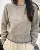 A contrast-trim merino wool sweater with crewneck, contrast trim, regular fit, long sleeves and stretch, designed for a cozy winter layering look that pairs from sneakers to boots.