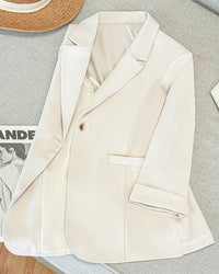 The Women's Three Quarter Sleeve Blazer from Gentle Herd. A lightweight notch lapel suit jacket in a relaxed straight cut — effortlessly polished for spring and summer.