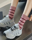 Women's Striped retro loose crew socks featuring a sculpted low-tube silhouette, ribbed cuff, and combed cotton blend fabric, perfect for delivering breathable comfort in cold office environments.