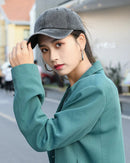 Washed soft-top baseball cap with a high ponytail opening and adjustable fit. Solid colour, vintage feel — versatile casual style for spring and summer.