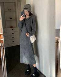 Extrafine merino wool knit maxi dress. Oversized V-neck pullover silhouette, naturally temperature-regulating, perfect for autumn and winter. 