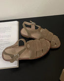 Women’s vintage flat sandals in brown, gladiator style open sandals with buckle strap and square heel, perfect for spring and summer casual wear.