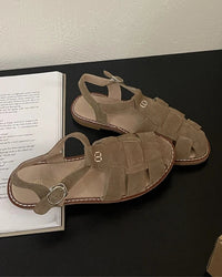 Women’s vintage flat sandals in brown, gladiator style open sandals with buckle strap and square heel, perfect for spring and summer casual wear.