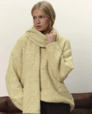 A Loose Soft V-Neck Sweater With A Scarf