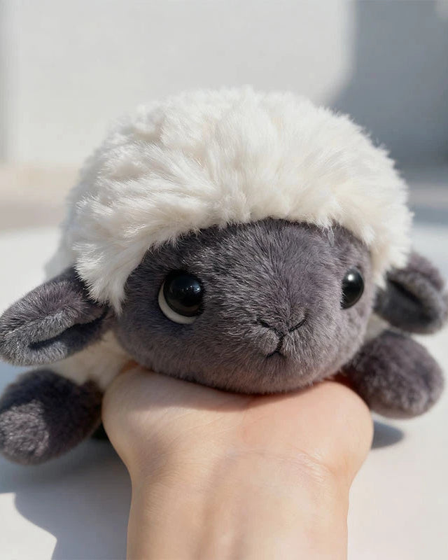 Soft plush lamb stuffed animal doll with PP cotton filling. CE certified, available in 18, 30, and 40 cm — a sweet gift for Christmas and birthdays.