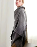 A faux cashmere thick wrap scarf featuring a soft, cozy texture and a generous drape for versatile, elegant warmth in cooler weather.