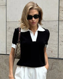 A wardrobe essential for the transitional season, this viscose knit top offers a softly relaxed fit designed to flatter.