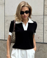 A wardrobe essential for the transitional season, this viscose knit top offers a softly relaxed fit designed to flatter.
