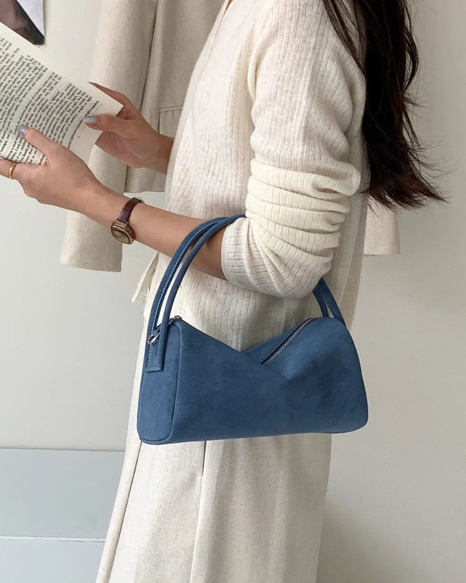 Quiet luxury in its simplest form. The velvety hand feel invites touch, catching light in soft shifts as you move.