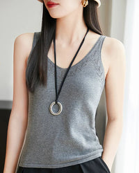 Women's loose-fit knitted cotton vest featuring breathable fabric, a sculpted neckline, and hollow-out details for effortless layering on city commutes or resort weekends.