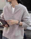 Camel relaxed wool zip cardigan for women with crewneck, full zip front, long sleeves and ribbed cuffs, a warm 100% wool fall-winter layer for everyday wear.