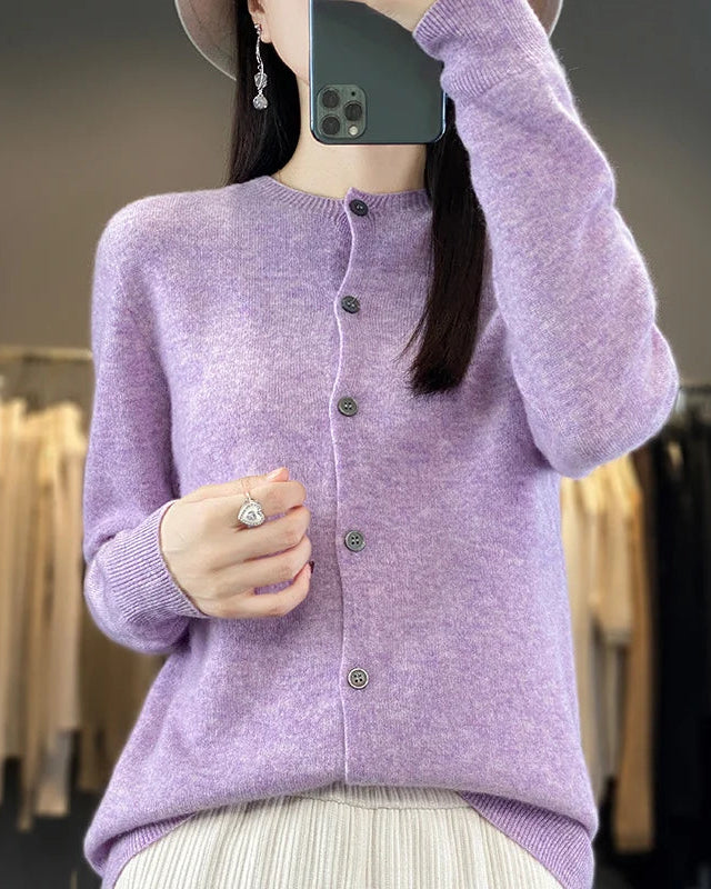 This merino wool cardigan wraps you in a cloud-like softness that only natural fiber can deliver. Knitted in a fine 12-gauge construction, it holds its shape beautifully through repeated wear while remaining feather-light on the body.