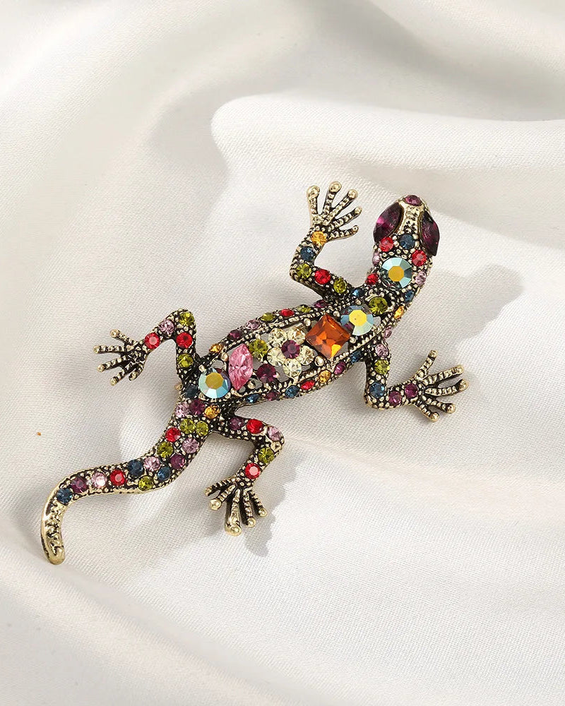 Colorful crystal lizard brooch in gold tone, trendy reptile pin with vibrant multicolor gemstones and detailed body, perfect for adding playful sparkle.
