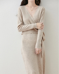 This seamless knit dress drapes with natural ease, its mid-calf length creating a graceful silhouette that flatters without effort. 