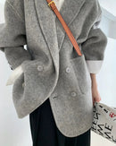 Crafted for an elegant yet relaxed wardrobe, this wool coat offers a softly textured hand feel and a clean suit inspired shape.